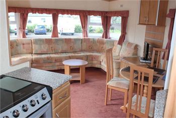 Photo of the lounge in a Delta Denbigh 2007 pre owned 2 bedroom static caravan for sale in Somerset